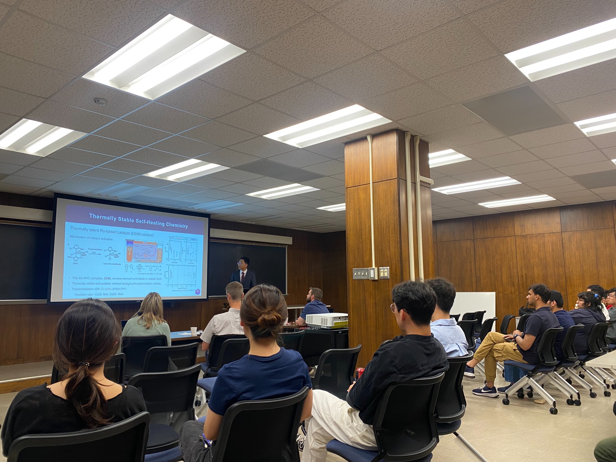 Young Bum Lee discussing thermally stable self-healing chemistry with a seminar audience.